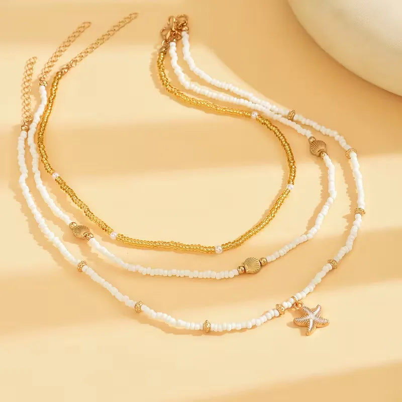 Ketting met schelp en ster
