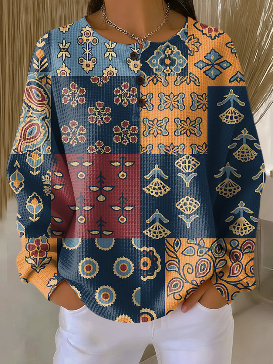 Anika | Pullover met etnisch ruitpatroon en bloemenprint