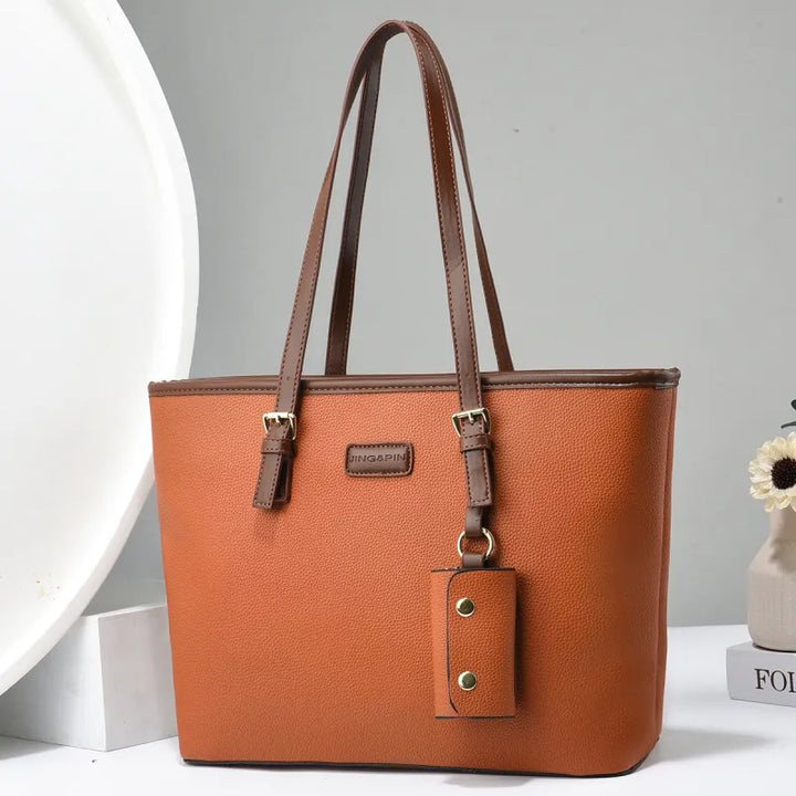 Arianna | Dames schoudertas met dubbele hengsels en hanger