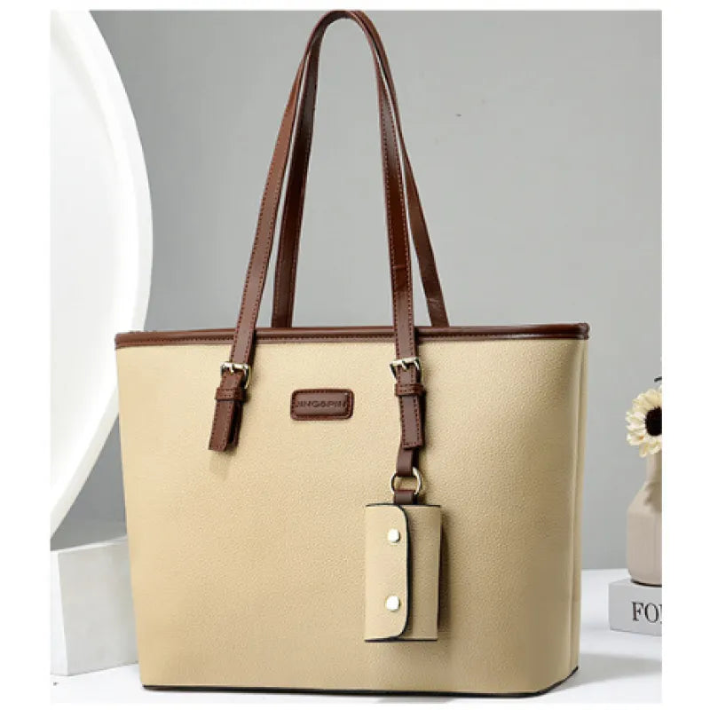 Arianna | Dames schoudertas met dubbele hengsels en hanger