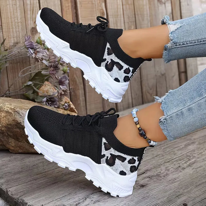 Lage sneaker met leopard print