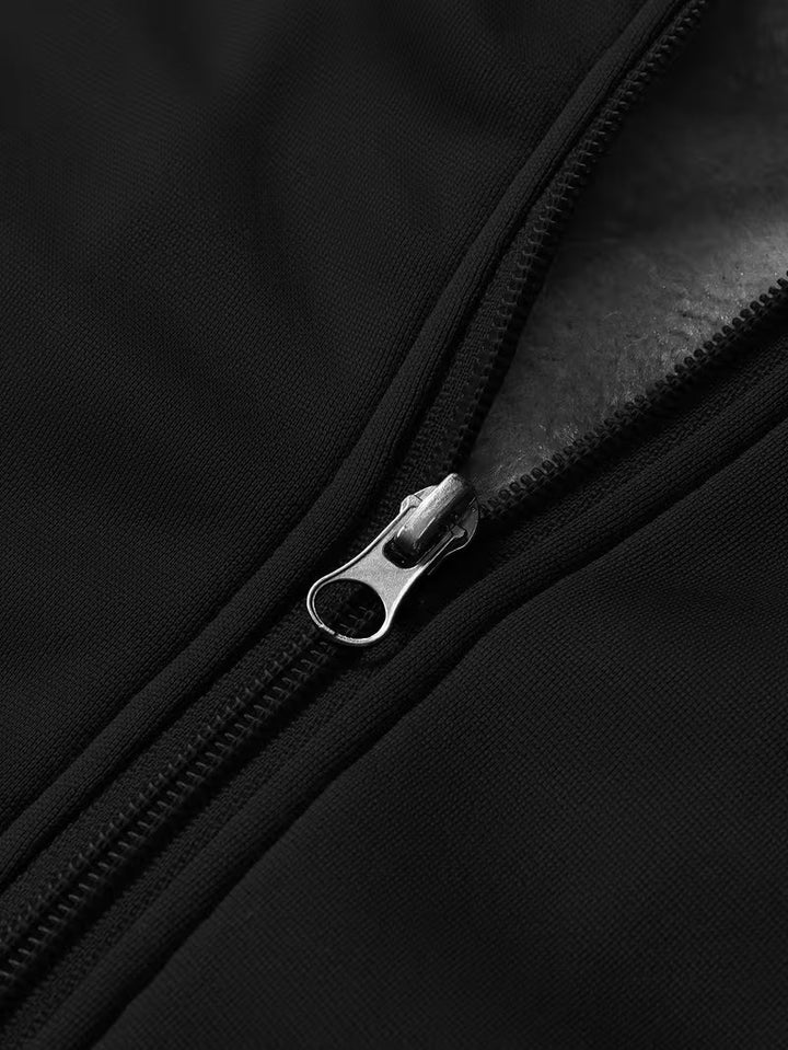 Fleece jas met capuchon en ritssluiting