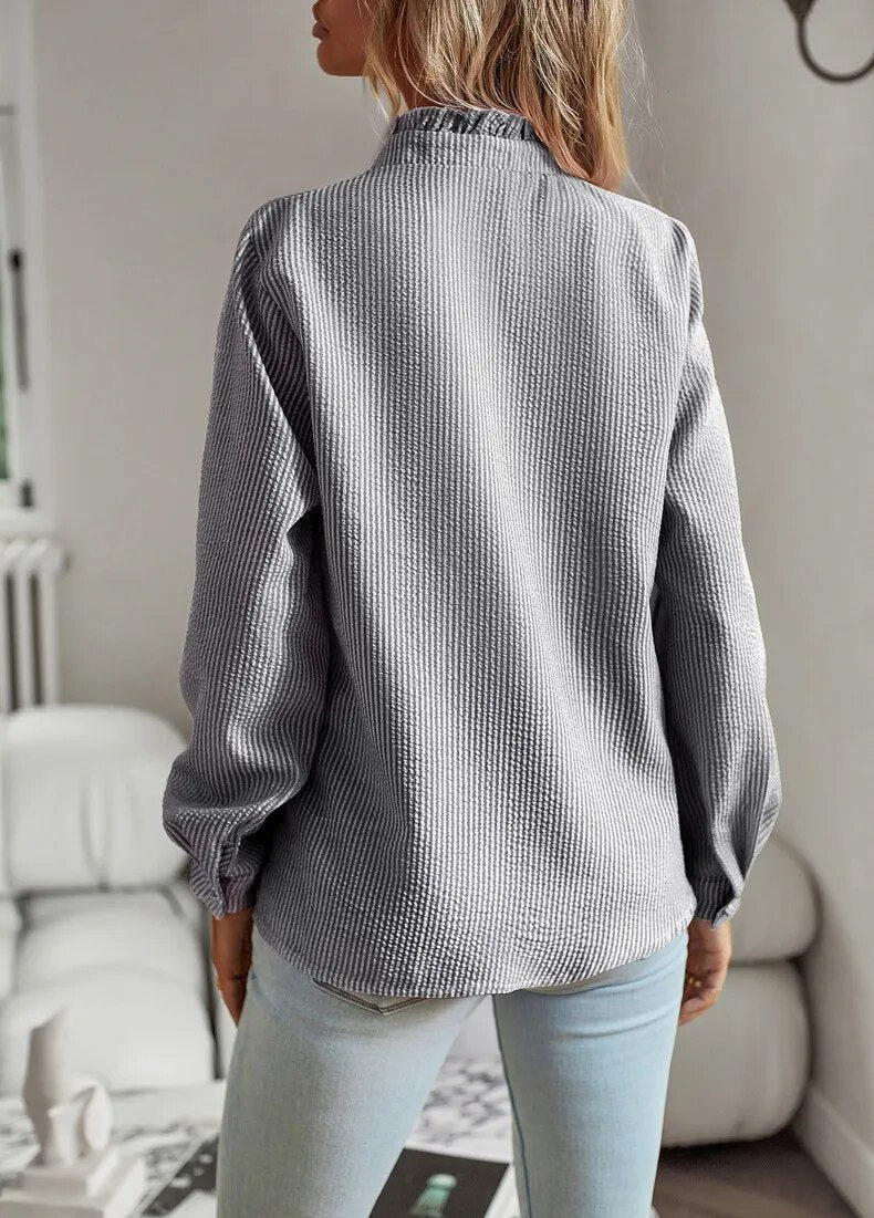 Jamie - Blouse met ruffles en opstaande kraag