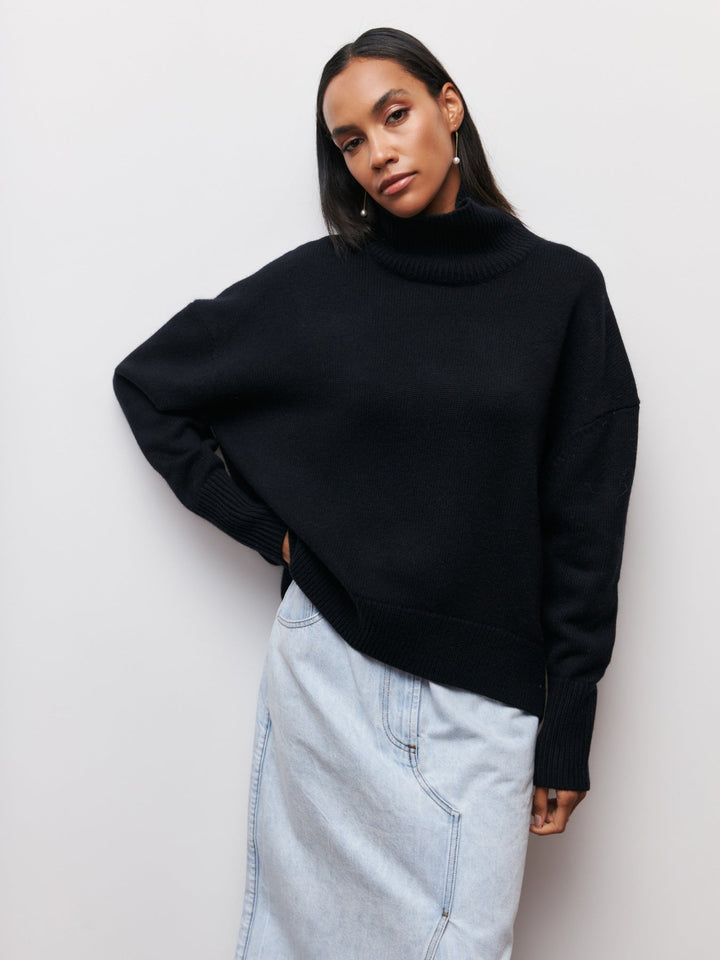 Oversized trui met hoge col en ribgebreide afwerking