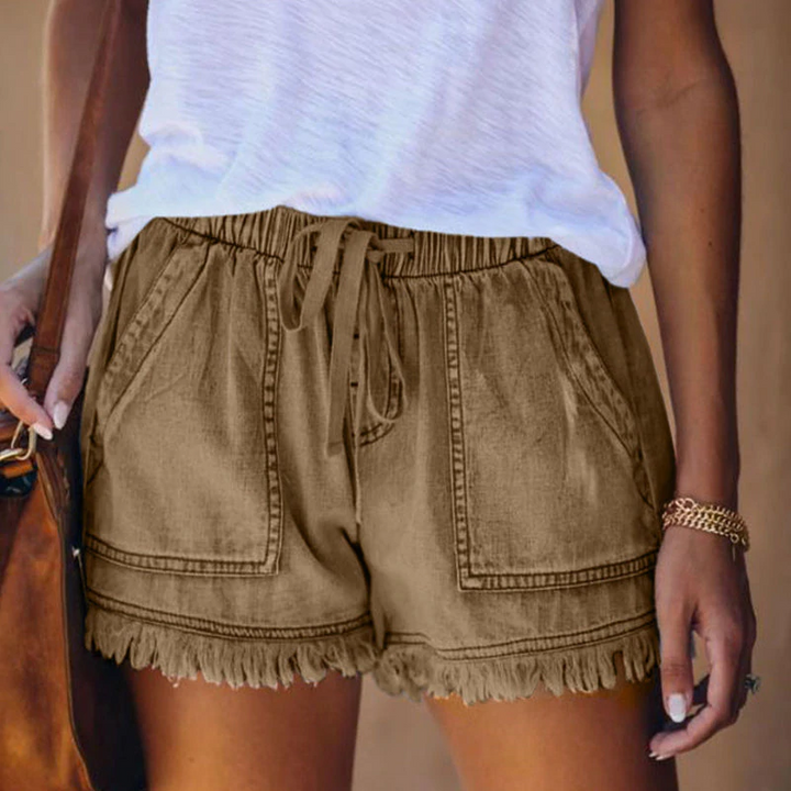 Comfortabele denim short met elastische tailleband en rafelranden
