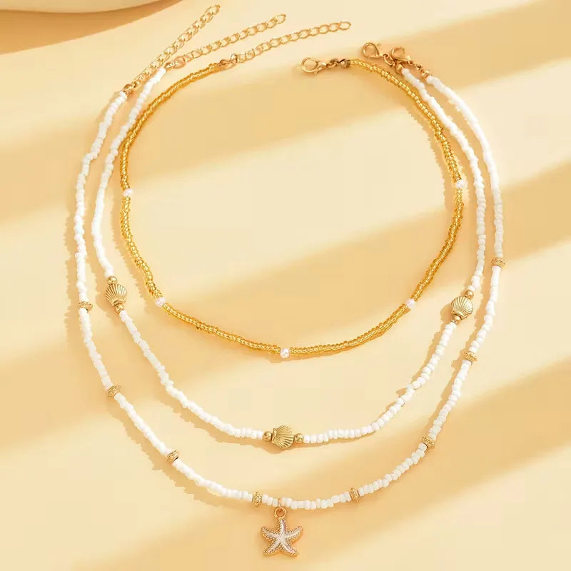 Ketting met schelp en ster