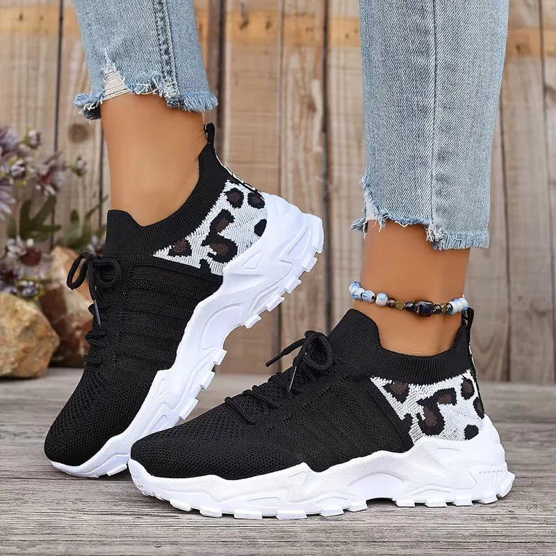 Lage sneaker met leopard print