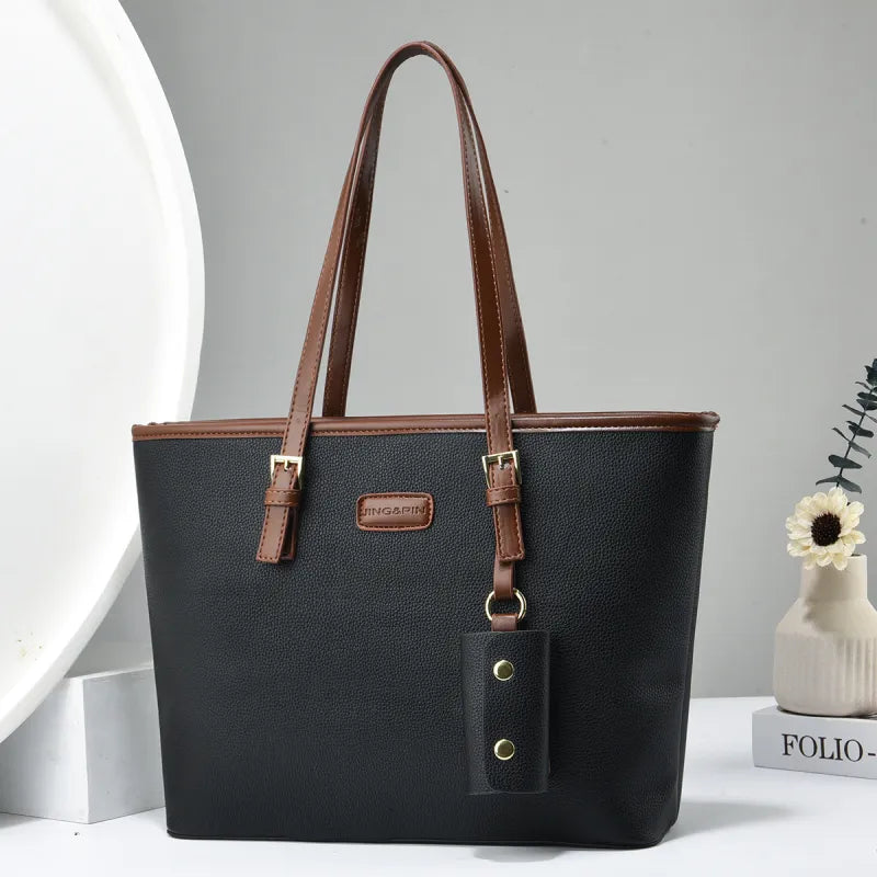 Arianna | Dames schoudertas met dubbele hengsels en hanger