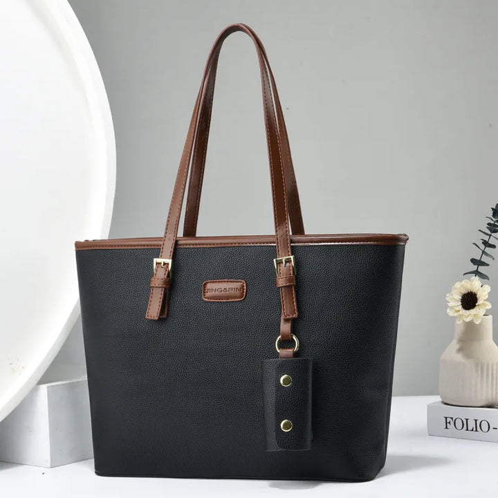 Arianna | Dames schoudertas met dubbele hengsels en hanger