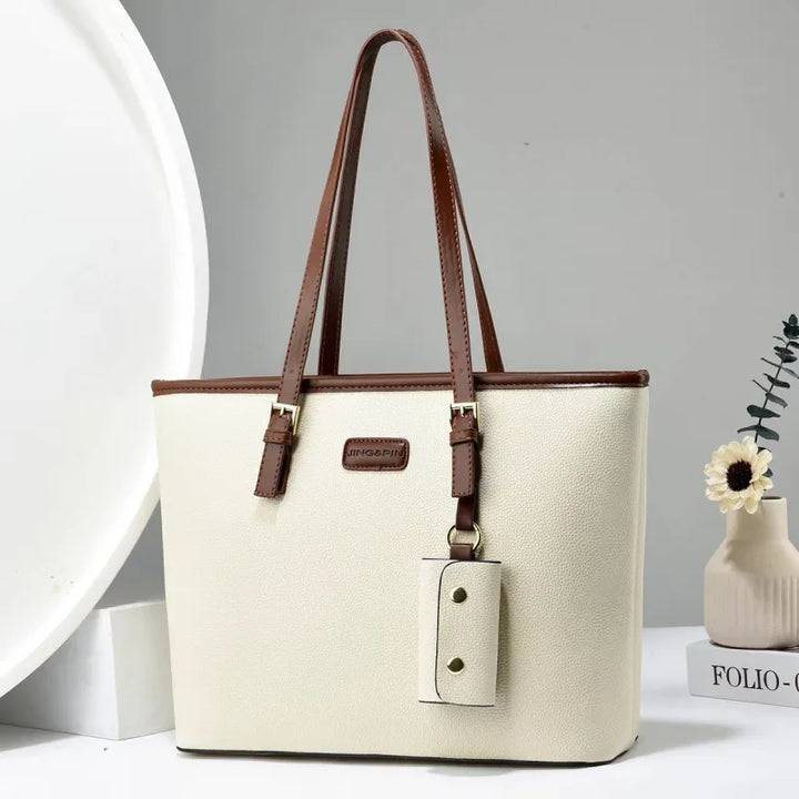 Arianna | Dames schoudertas met dubbele hengsels en hanger