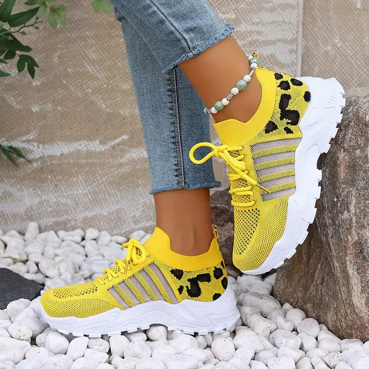 Lage sneaker met leopard print