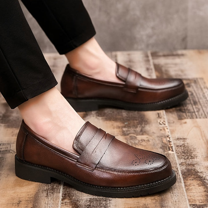 Jasper | Heren penny loaferschoenen met brogue details