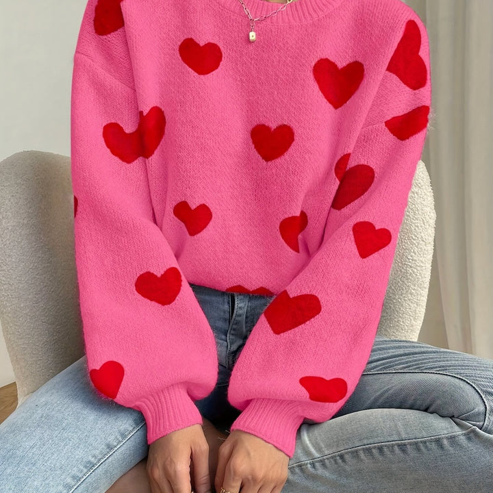 Sara | Roze trui met rood hartpatroon en ronde hals